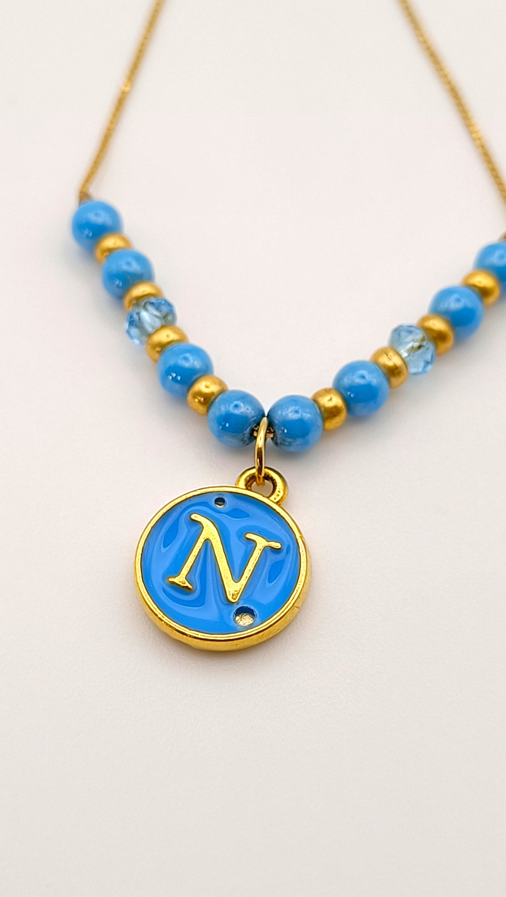 Bracciale Azzurro Ciondolo "N"