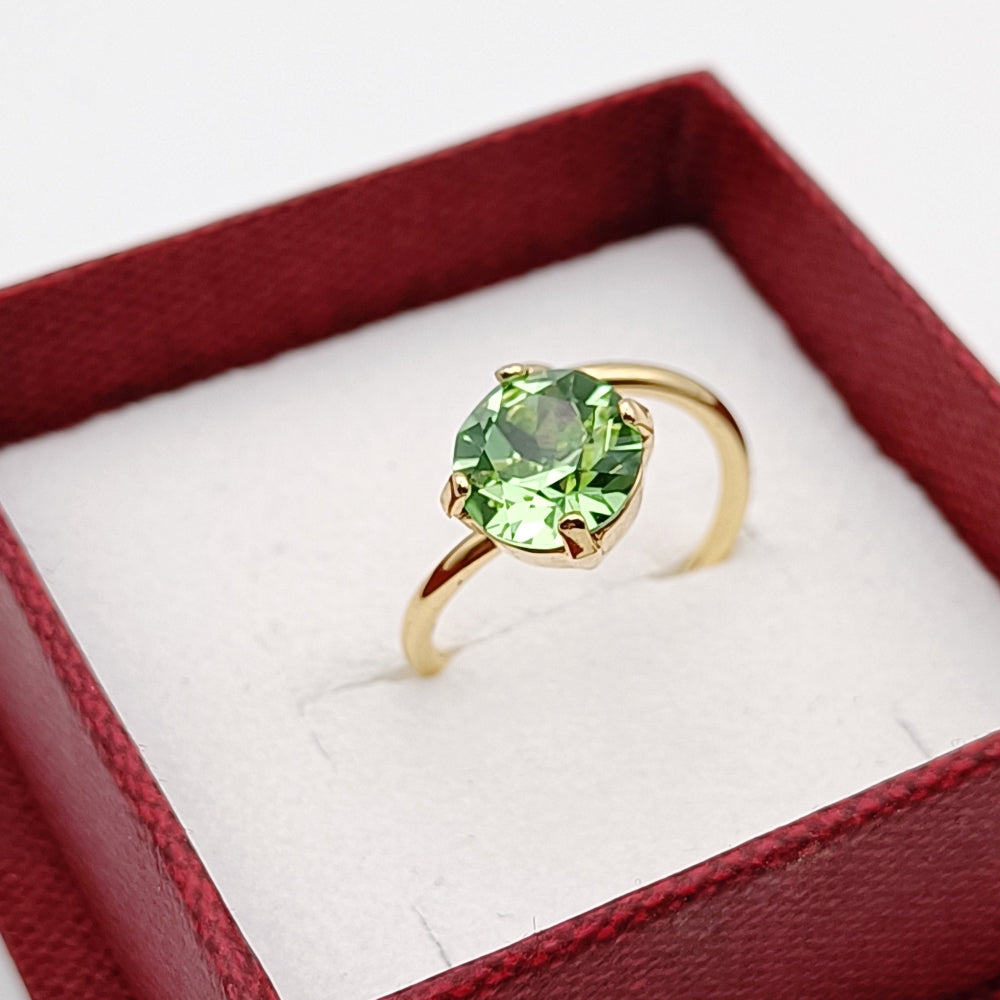 Anello regolabile di ungioielloperte.com in metallo dorato con cristallo Swarovski verde chiaro in scatola regalo