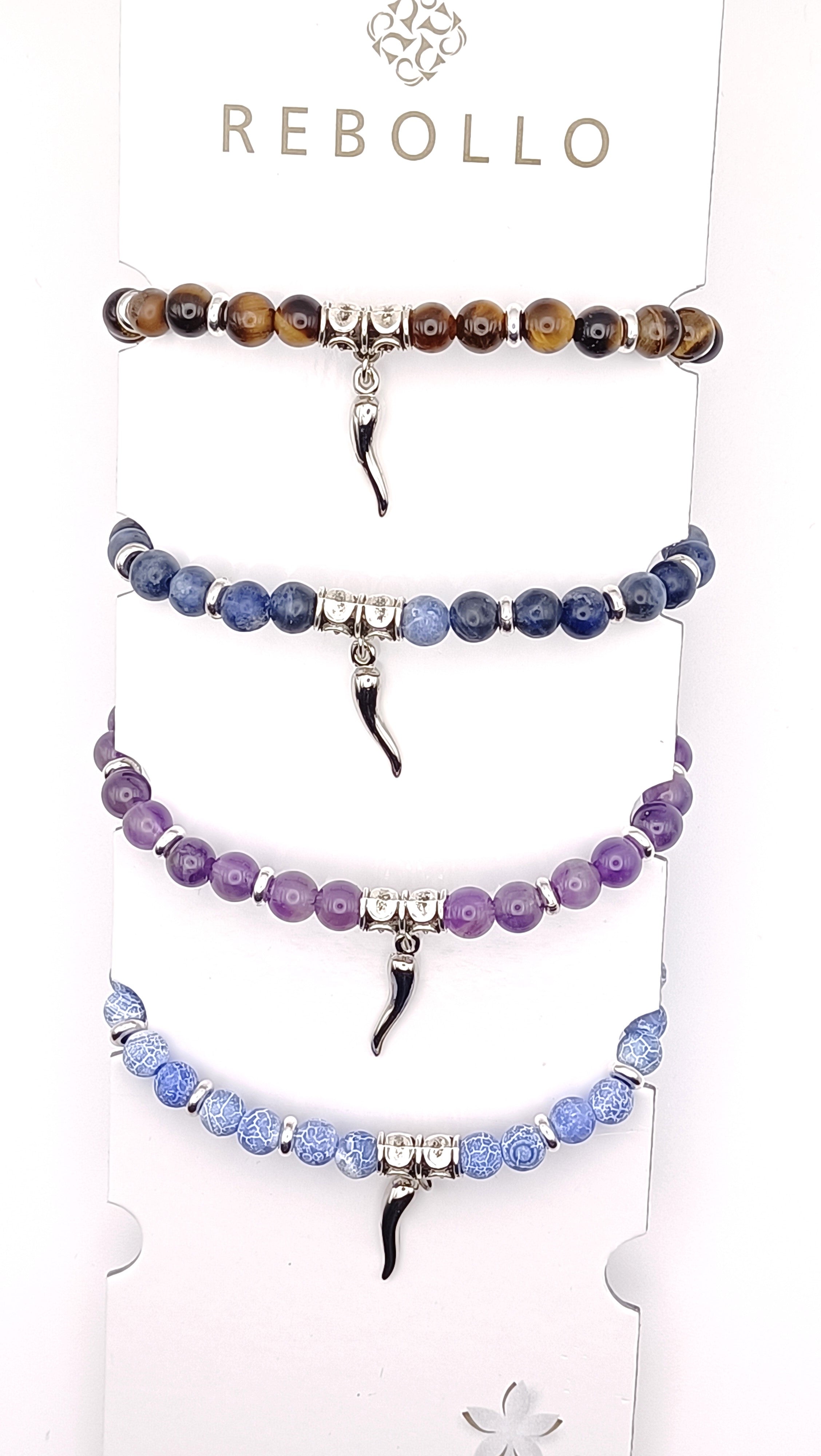 Espositore con bracciali con pietre naturali di manifattura Rebollo