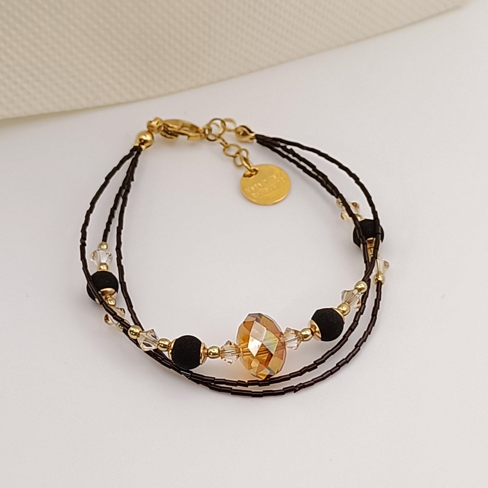 Bracciale con pietra lavica e perle vetro ambra - ungioielloperte