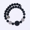 Bracciale di ungioielloperte.com in pietra lavica sintetizzata e cristalli Swarovski 