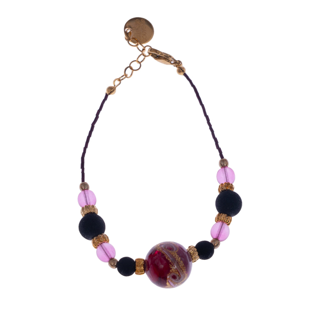 Bracciale di ungioielloperte.com con perla centrale in vetro di Murano rosa e perline in pietra lavica