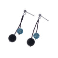 Orecchini pendenti di ungioielloperte.com con perle in pietra lavica e cristalli Swarovski azzurri