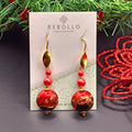 Orecchini pendenti in vetro di Murano rosso con minuterie dorate