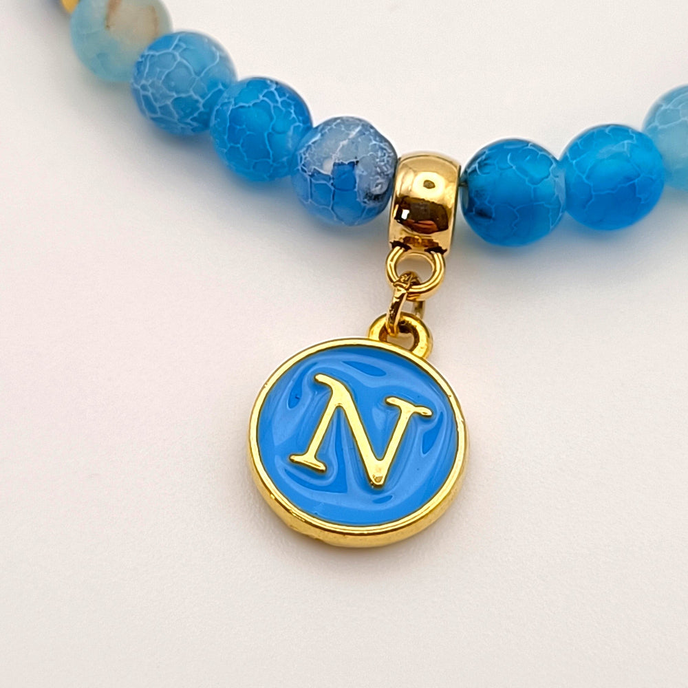 Bracciale Forza Napoli con ciondolo lettera N color oro perle azzurro mare - ungioielloperte